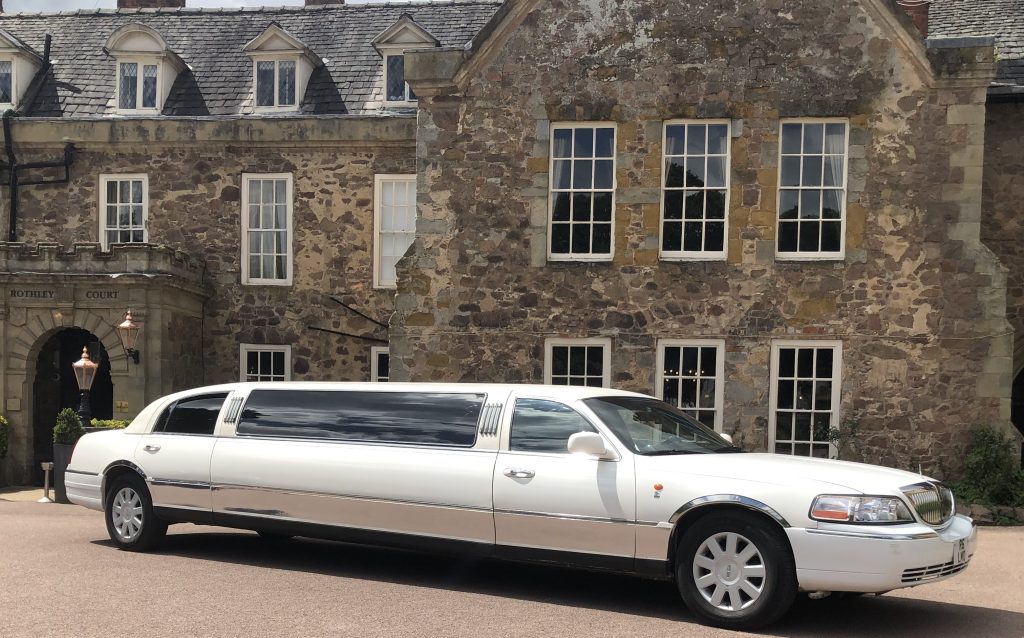 London Lincoln Town car beside park