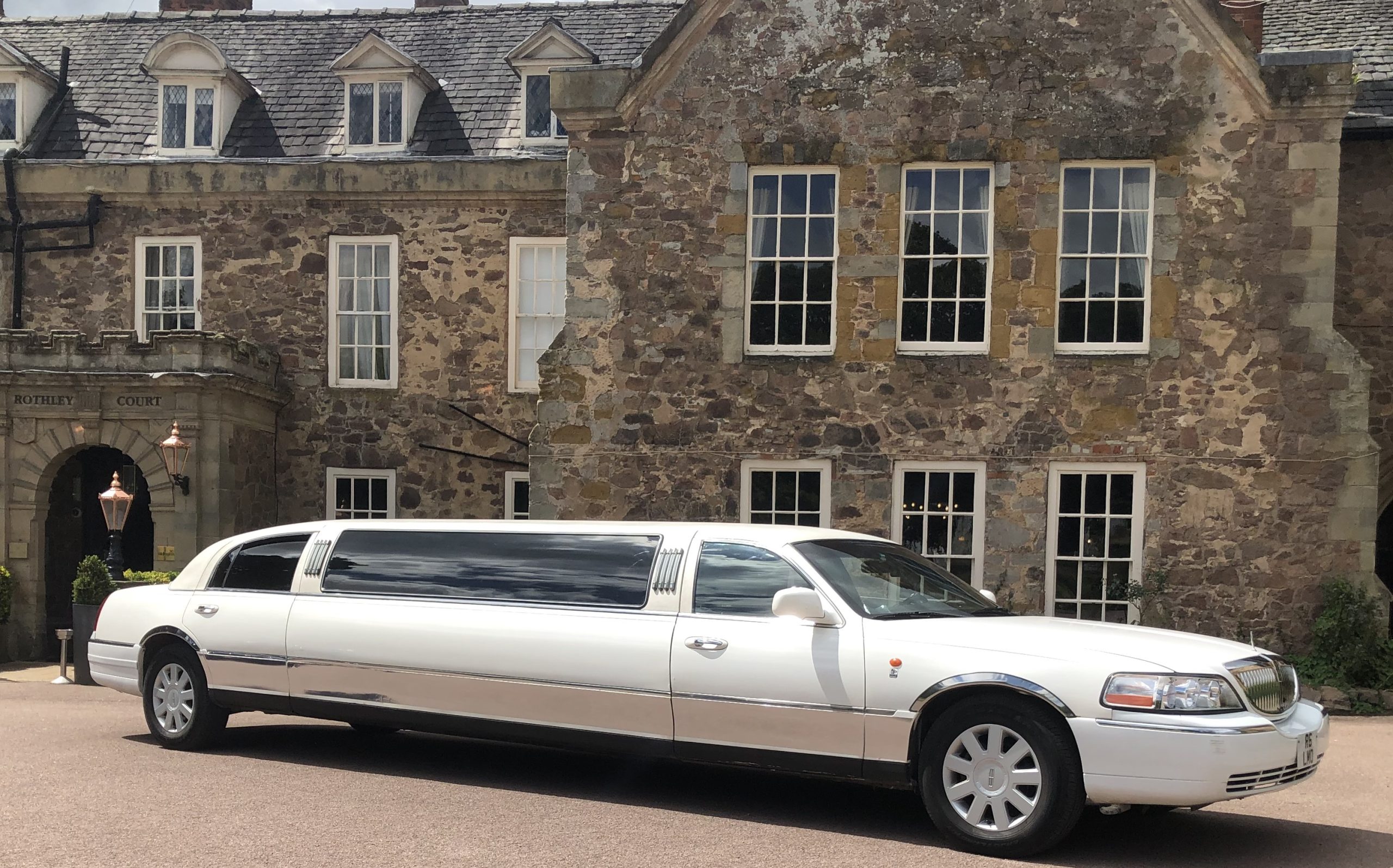 London Lincoln Town car beside park